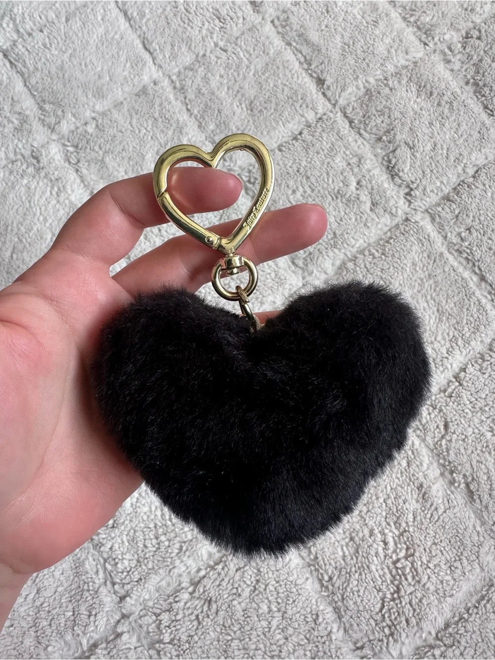Juicy Couture | Black faux fur heart keychain charm featuring gold-tone Hardwear